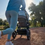 Mom jogging with best jogging stroller under 250